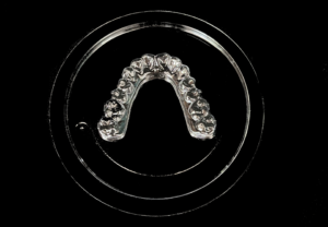 material and thickness for a clear aligner and retainer